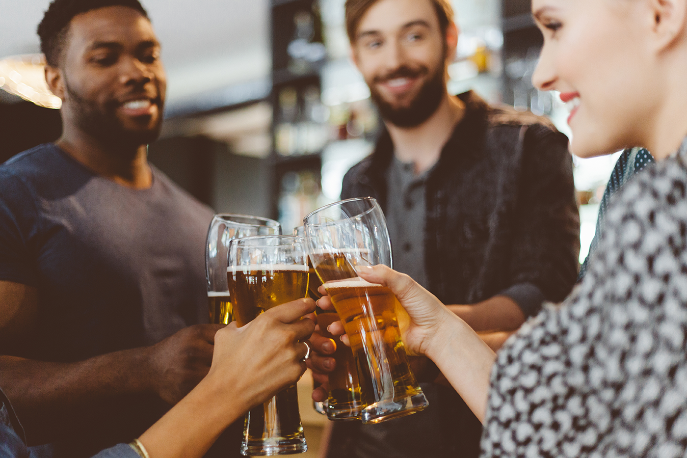 Group of people sharing drinks